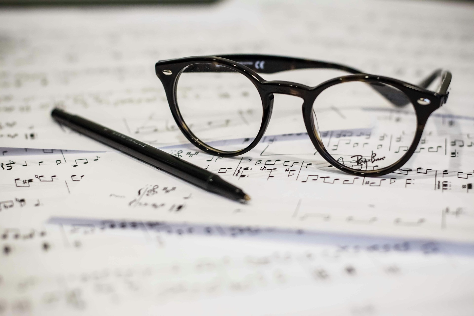 Glasses on a musical score to represent rights-inclusive music